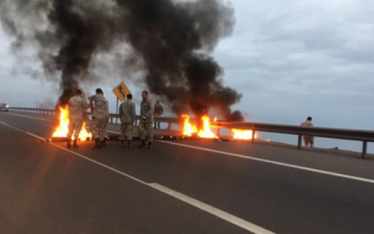 Fiscalía logra condena de acusado por barricadas incendiarias camino al aeropuerto