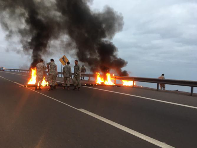 Fiscalía logra condena de acusado por barricadas incendiarias camino al aeropuerto